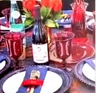 Red goblets and navy chargers