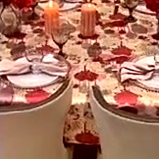 Floral tablecloth with candles